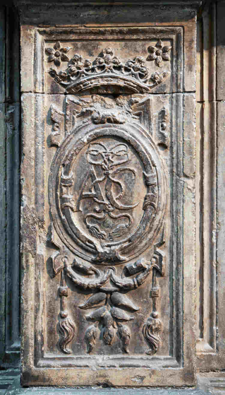 AC initials of Anne of Cleves carved on the side of her tomb