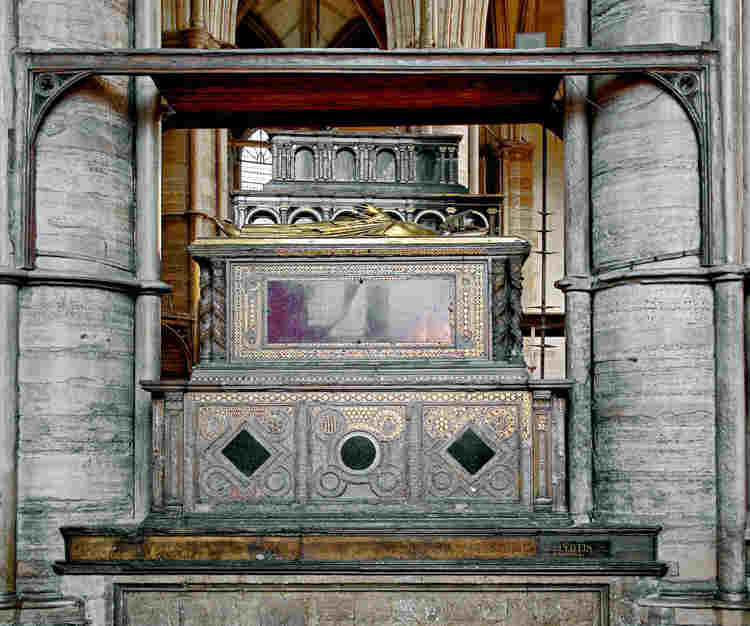 Henry III's tomb with bronze effigy on top and purple and green porphyry and gilding on the sides