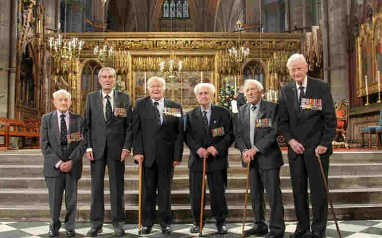 Six Battle of Britain veterans standing near Westminster Abbey's high altar