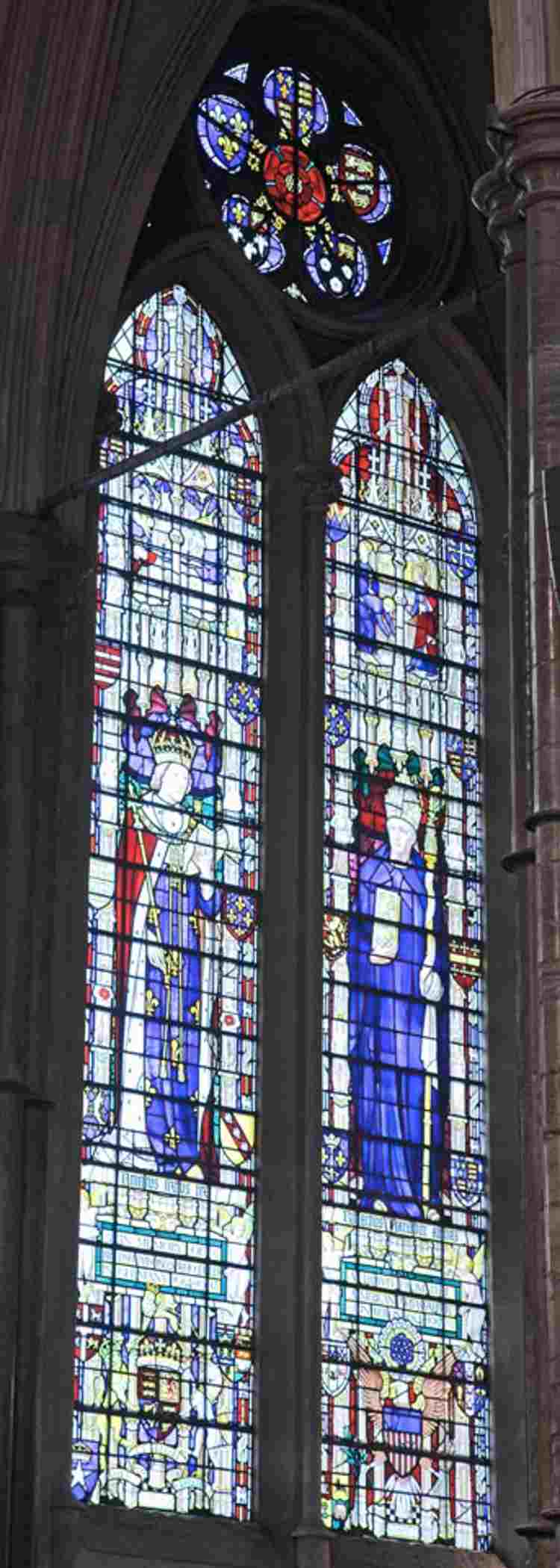 Stained glass window remembering British Prisoners of War 1914-18 with large figures of Henry VI and Abbot Harweden.