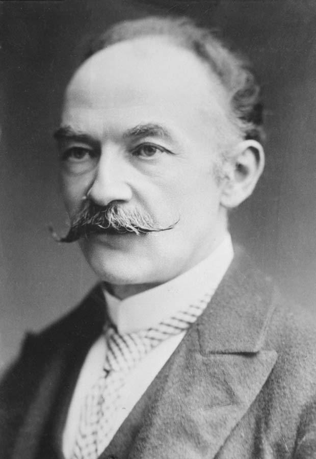 Black and white photo of Thomas Hardy, each of end of his moustache curled