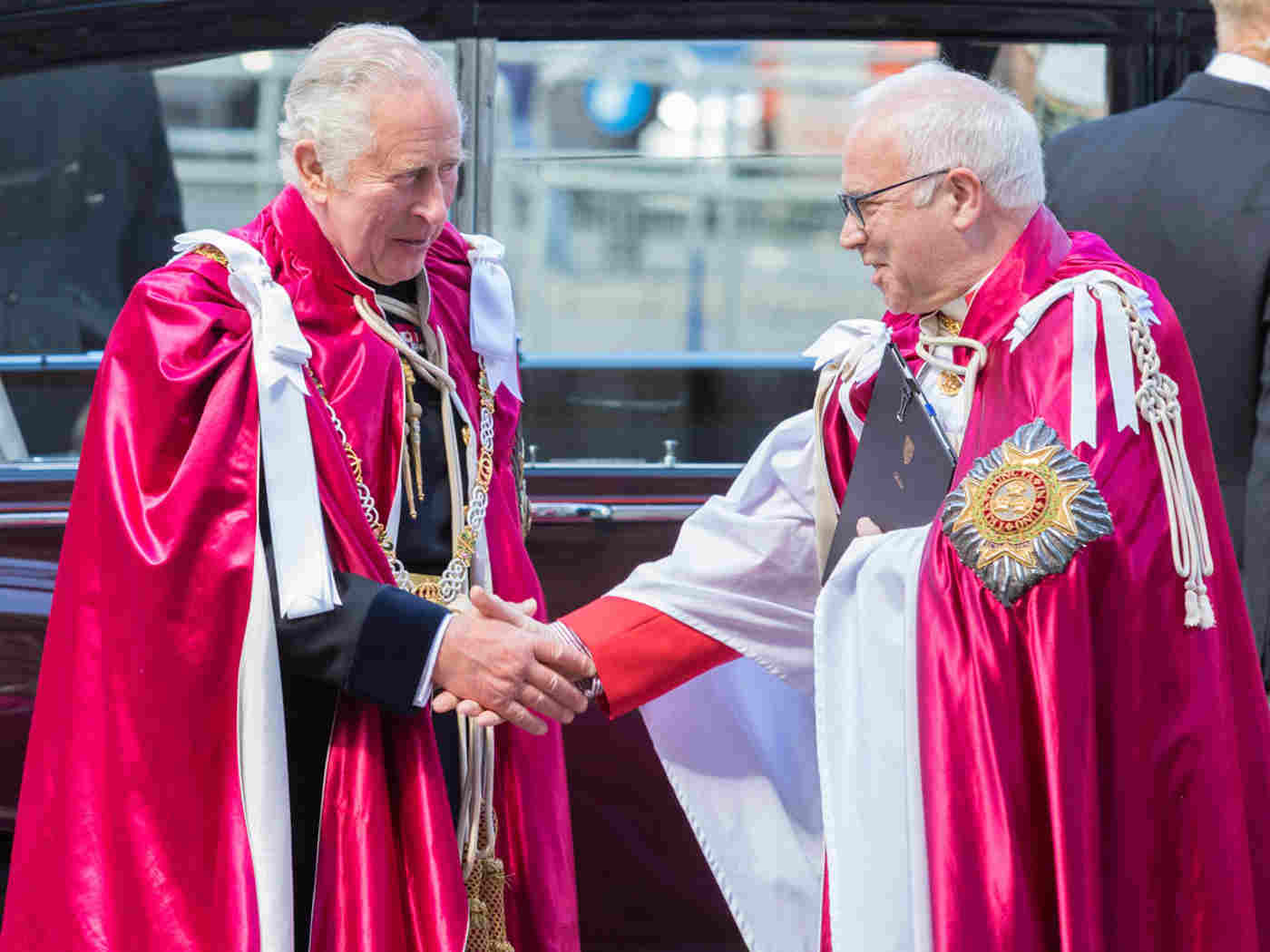 HRH Prince Charles shaking hands with The Dean