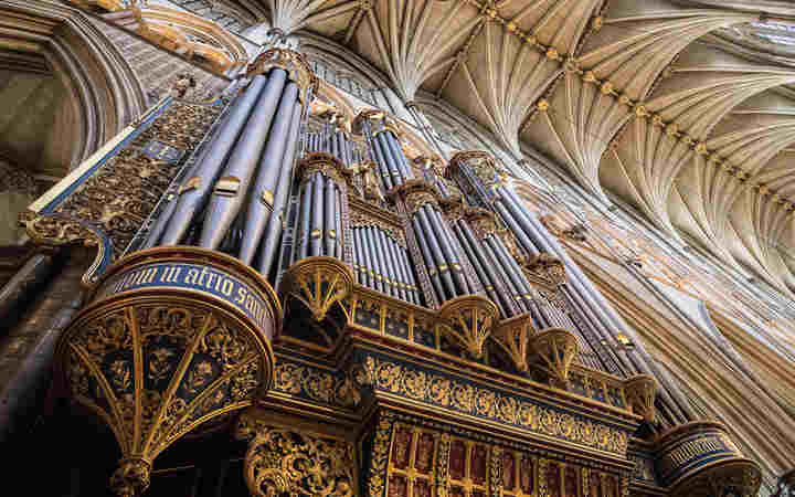 Photograph looking up at the organ in Westminster Abbey, representing music at coronations
