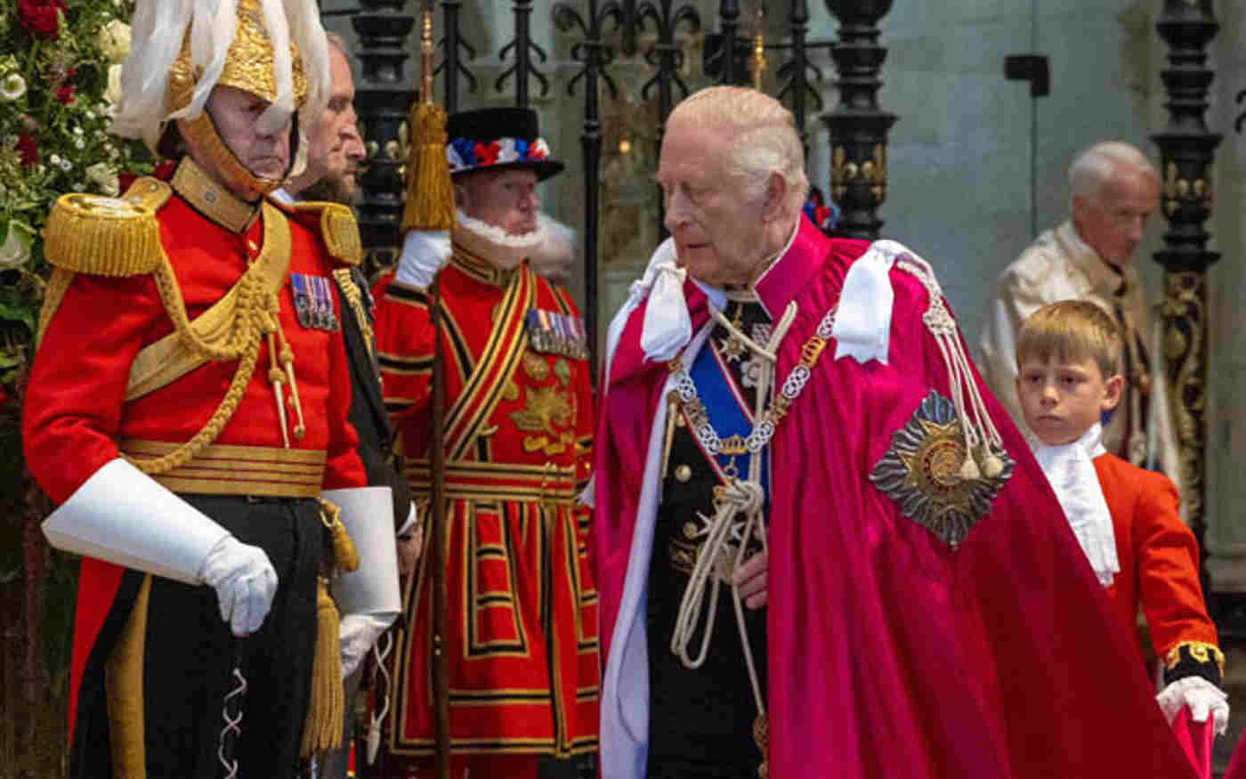 King Charles III wears the red robe of Sovereign of the Order of the Bath