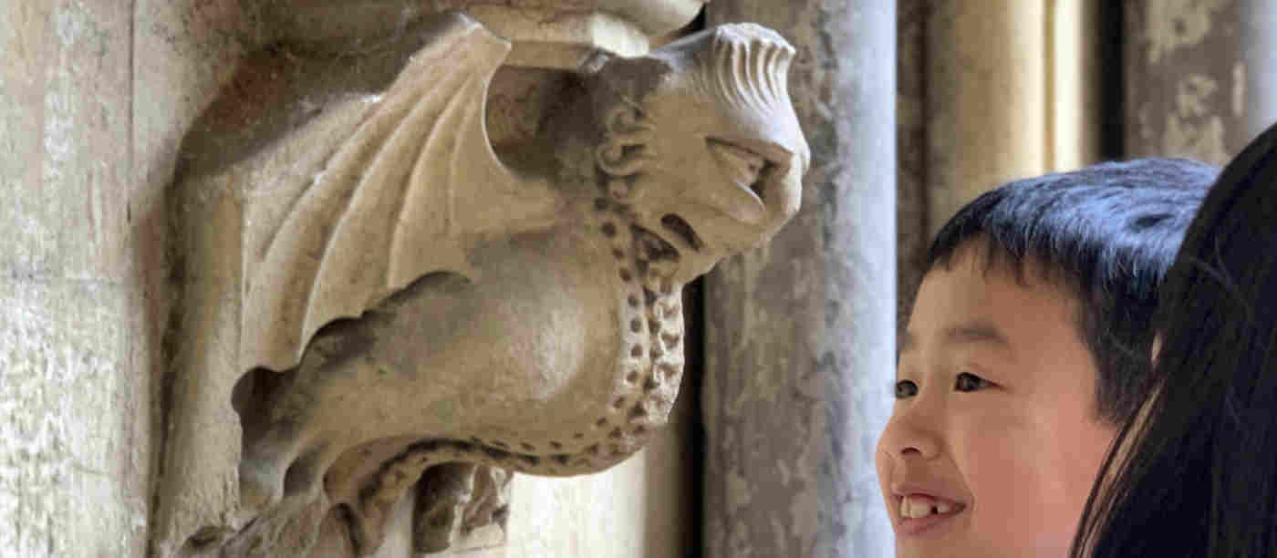 Photograph of stone gargoyle on the roof of Westminster Abbey