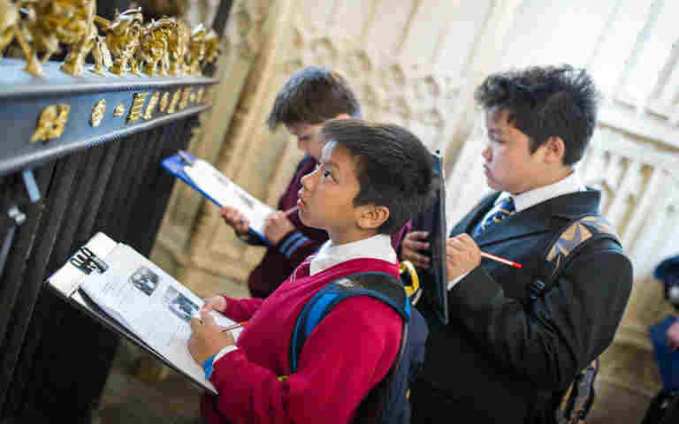 Photograph of primary school students on a self led visit of Westminster Abbey