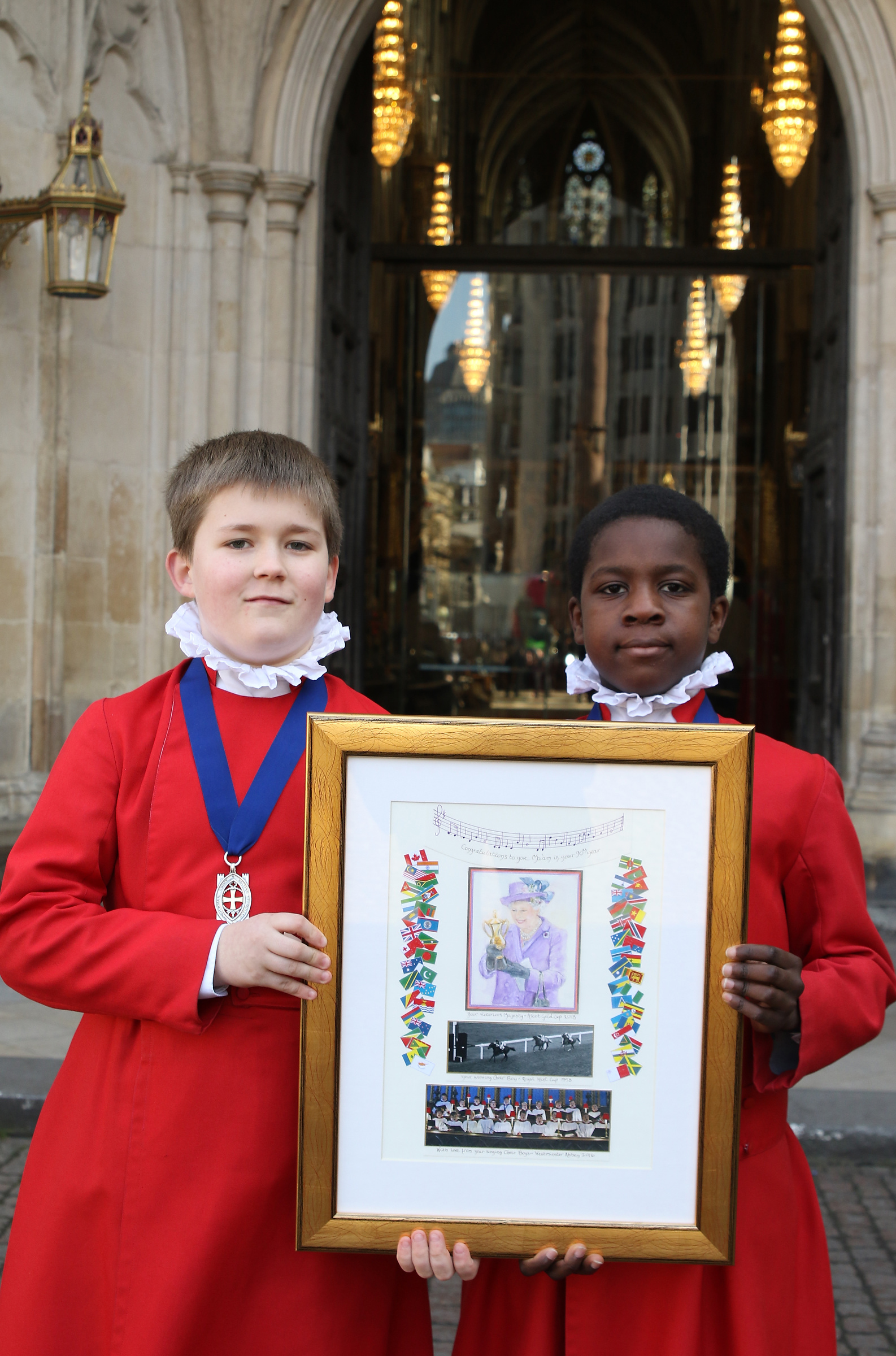 Choristers Daniel (left) and Jeremy with the Photograph of the Choir Boy
