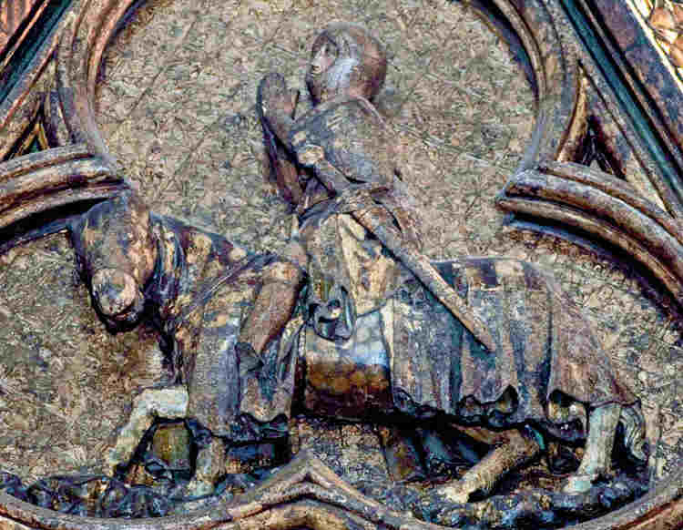 A praying knight on horseback