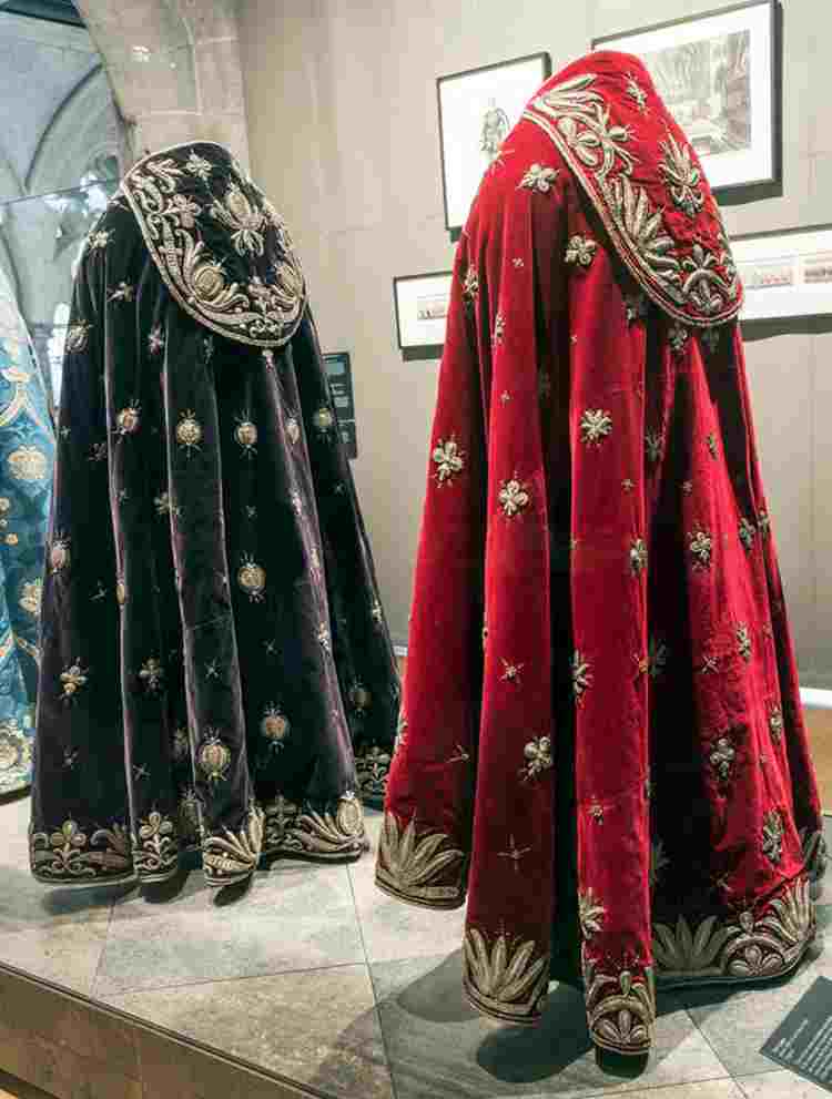 Dark purple cope and red cope, with brocade decoration from the time of Charles II