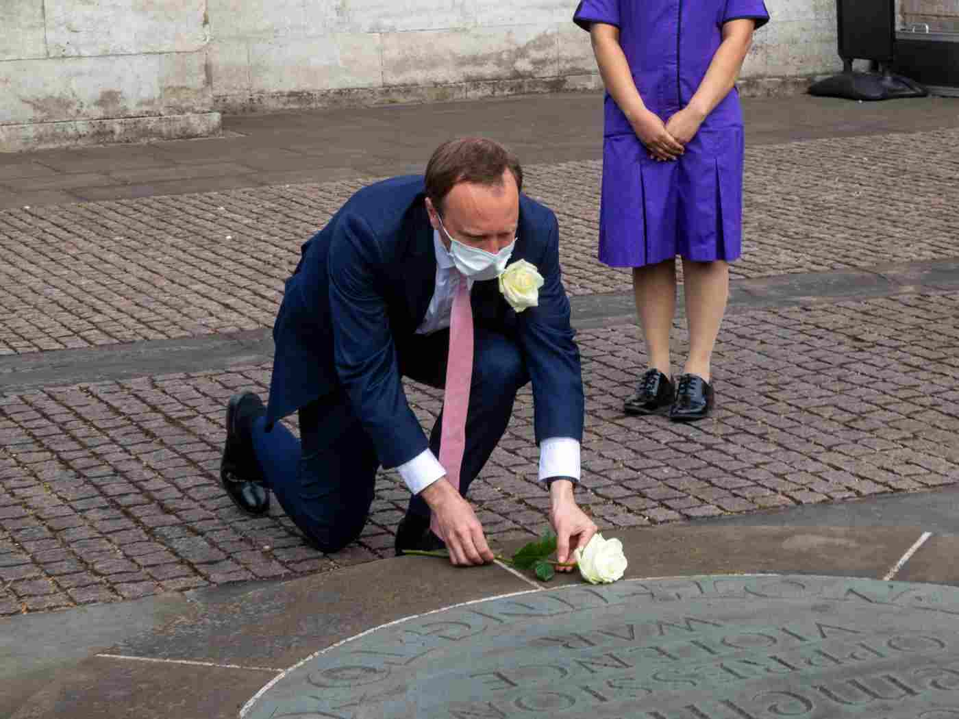 A white rose is laid on the Innocent Victims’ Memorial