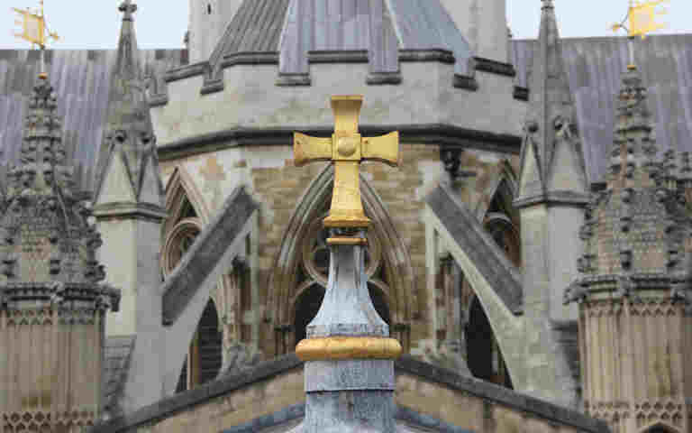 Photograph of gold cross on top of the Lady Chapel roof of Westminster Abbey