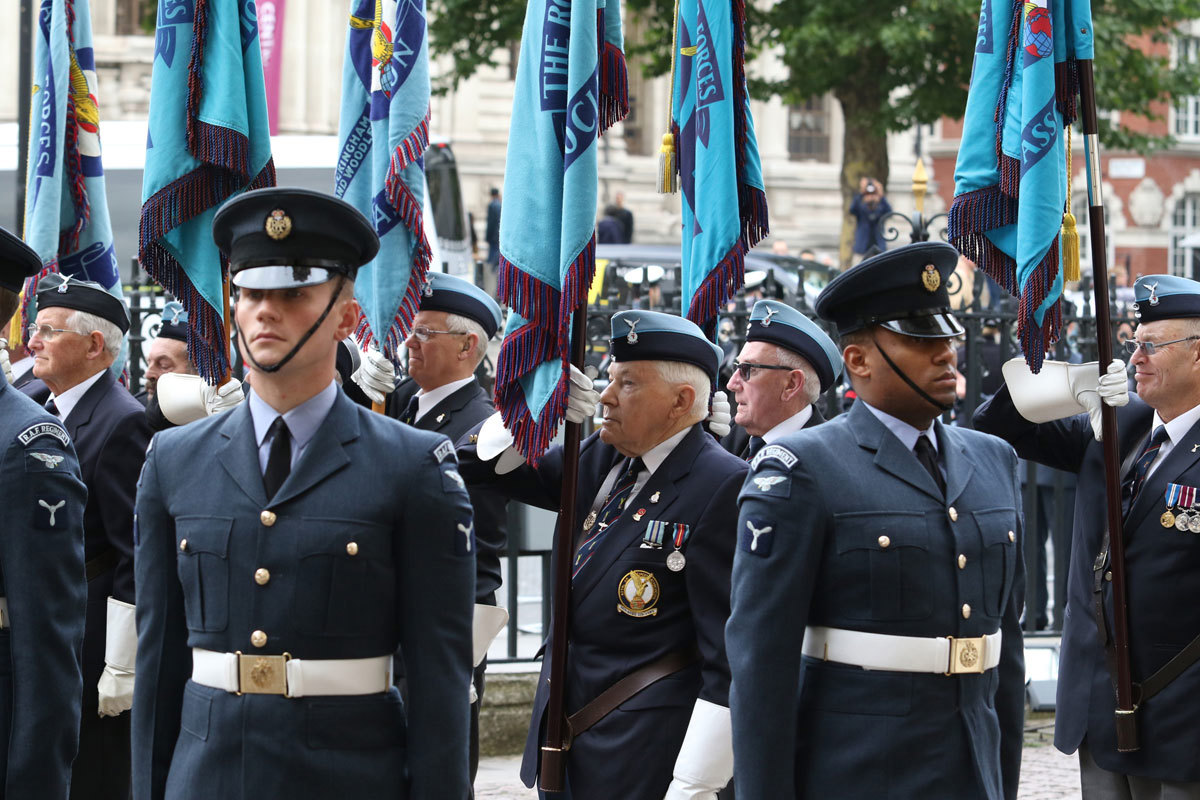 Royal Air Force standard bearers outside the Abbey before the service