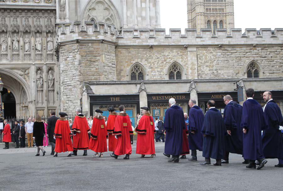 The Lord Mayor and Councillors of Westminster parade into Westminster Abbey in their robes