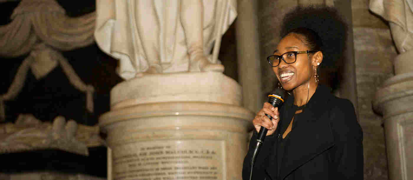 Photograph of young person speaking in Westminster Abbey representing communities case studies