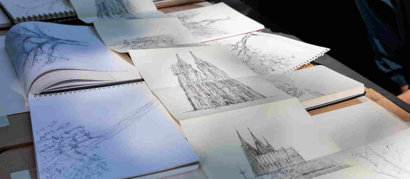 Photograph of multiple pencil drawings of the exterior of Westminster Abbey