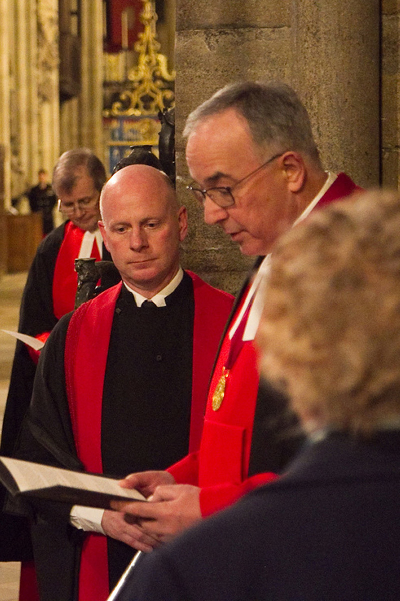 The Dean gives the Bidding