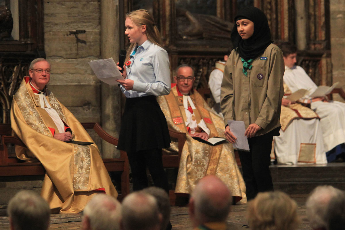 Sophie Hicks, Guide and Sara Jugon, Explorer, reads Testimonies