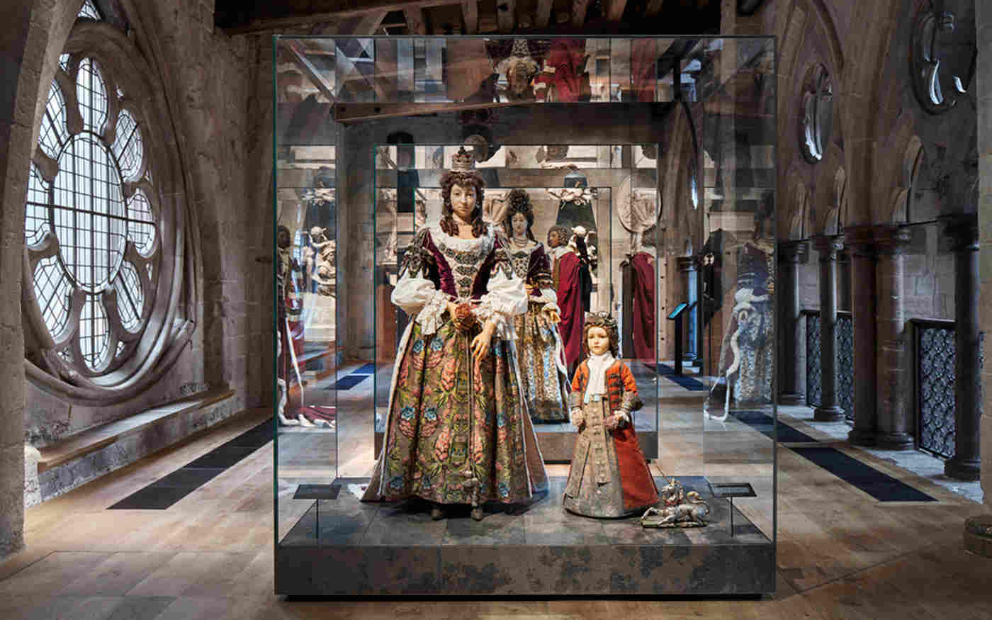 Wax effigies of the Duchess of Buckingham, her son Robert and a toy unicorn on display in a glass case in the Queen's Diamond Jubilee Galleries, Westminster Abbey