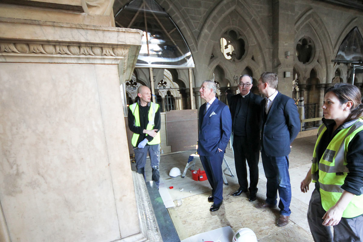 HRH The Prince of Wales views the conservation work being undertaken, and speaks to conservators