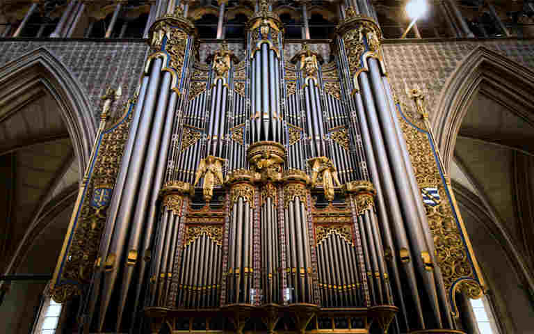Photograph of organ pipes within Westminster Abbey, representing an introduction video about the organ