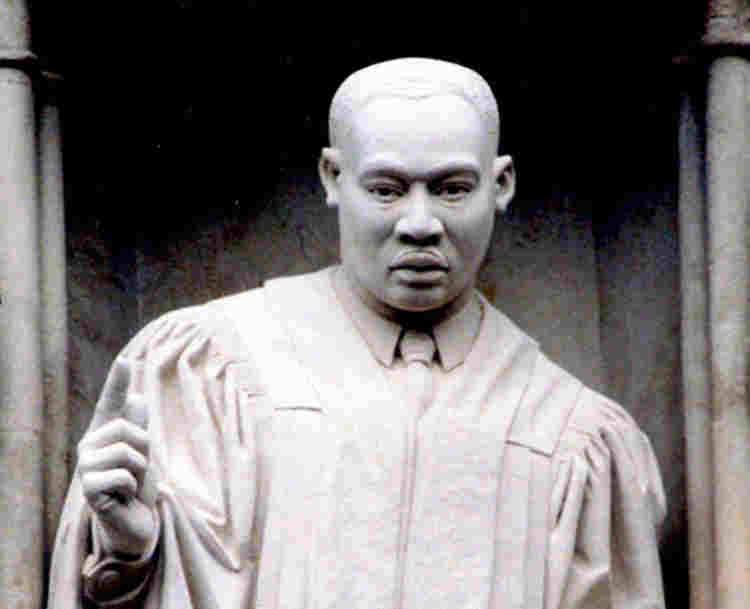 Photograph of Dr Martin Luther King Jr statue, one of 10 modern martyrs above the Great West Door at Westminster Abbey