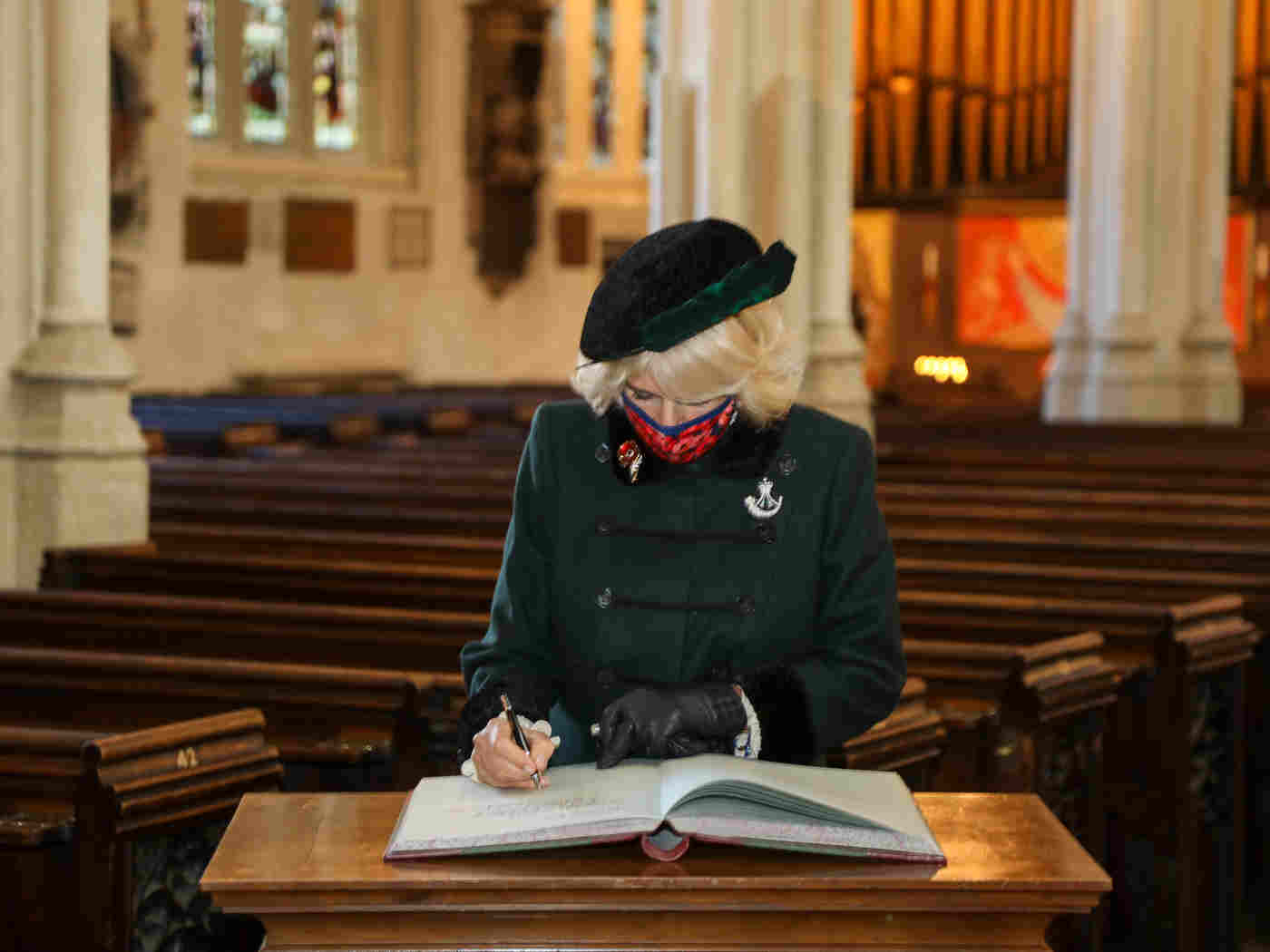 HRH The Duchess of Cornwall signs the Distinguished Visitors' Book