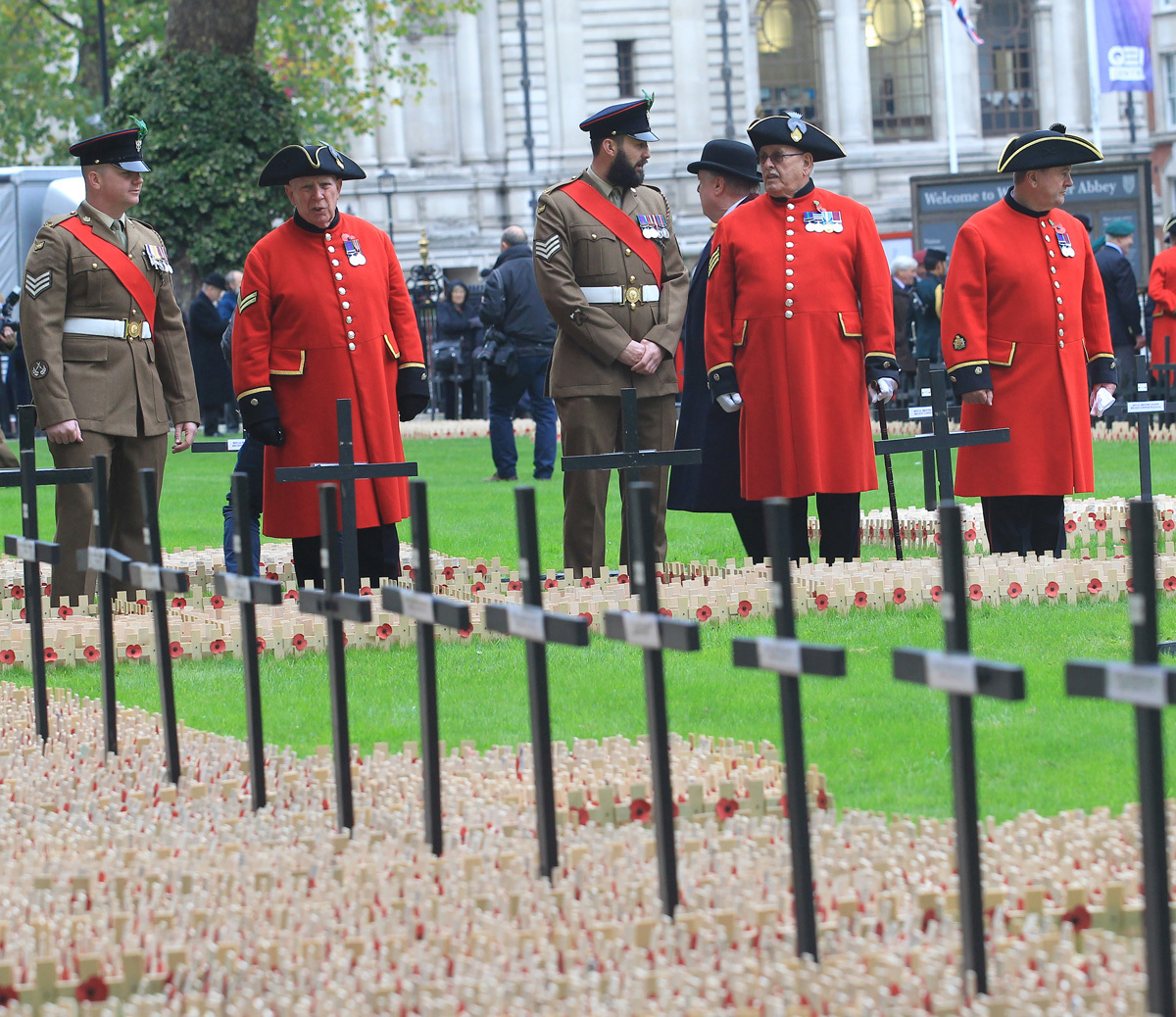 Chelsea Pensioners and Service Personnel view the Field of Remembrance