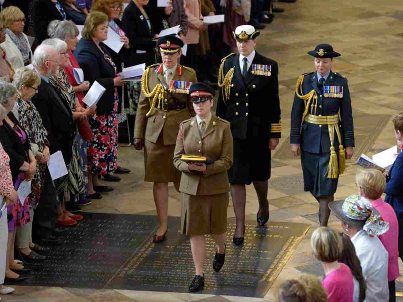 The Nurses’ Roll of Honour is processed through the Abbey church