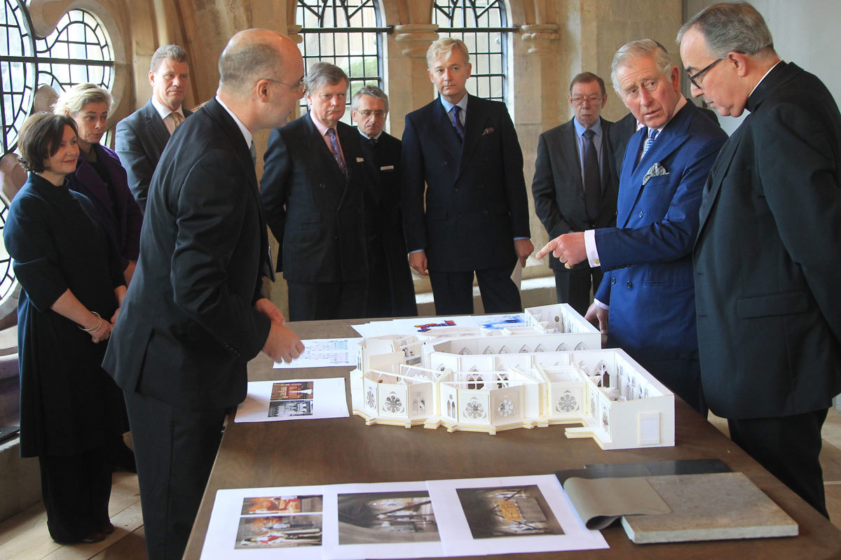 HRH The Prince of Wales meets specialists working on the project and is shown a model of the new galleries