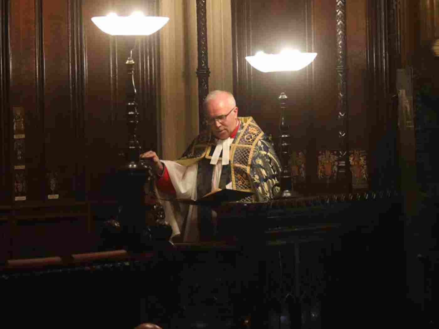 The Dean in his stall in the Lady Chapel