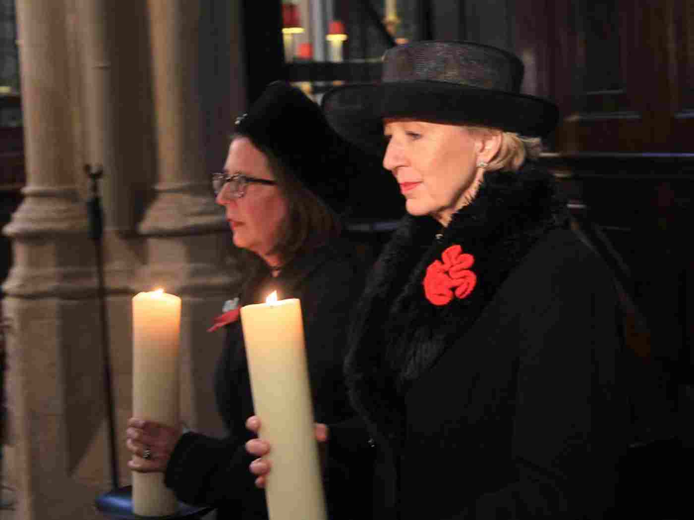 Candles are borne into the church by Baroness Evans, Leader of the House of Lords, and Andrea Leadsom, Leader of the House of Commons