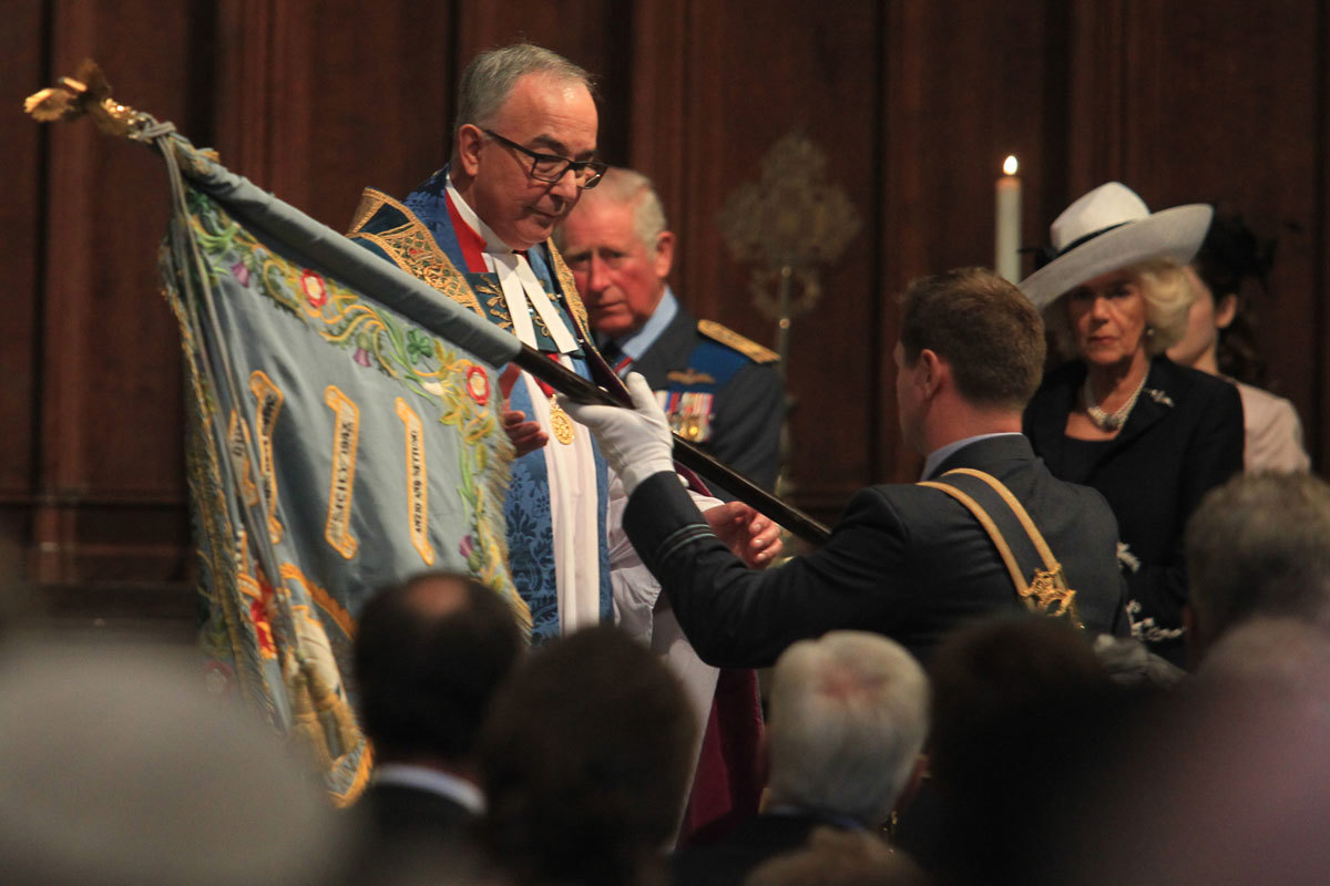 The standard of No. 72 Squadron is received by The Dean