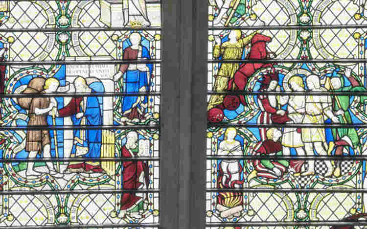 Figures of Christian and Goodwill, and Christian in Vanity Fair in Bunyan window