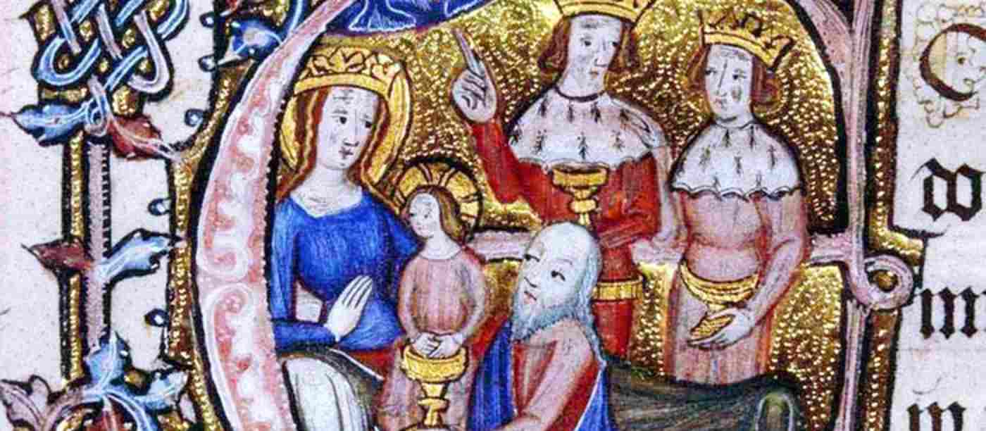 A depiction of the epiphany - a man offers a goblet to a woman and a small child. Two men wearing crowns are stood behind