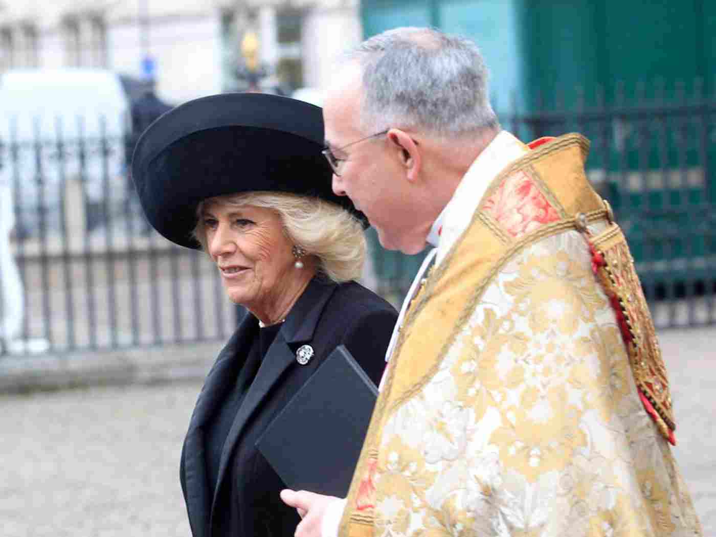 HRH The Duchess of Cornwall leaves the services escorted by The Dean of Westminster