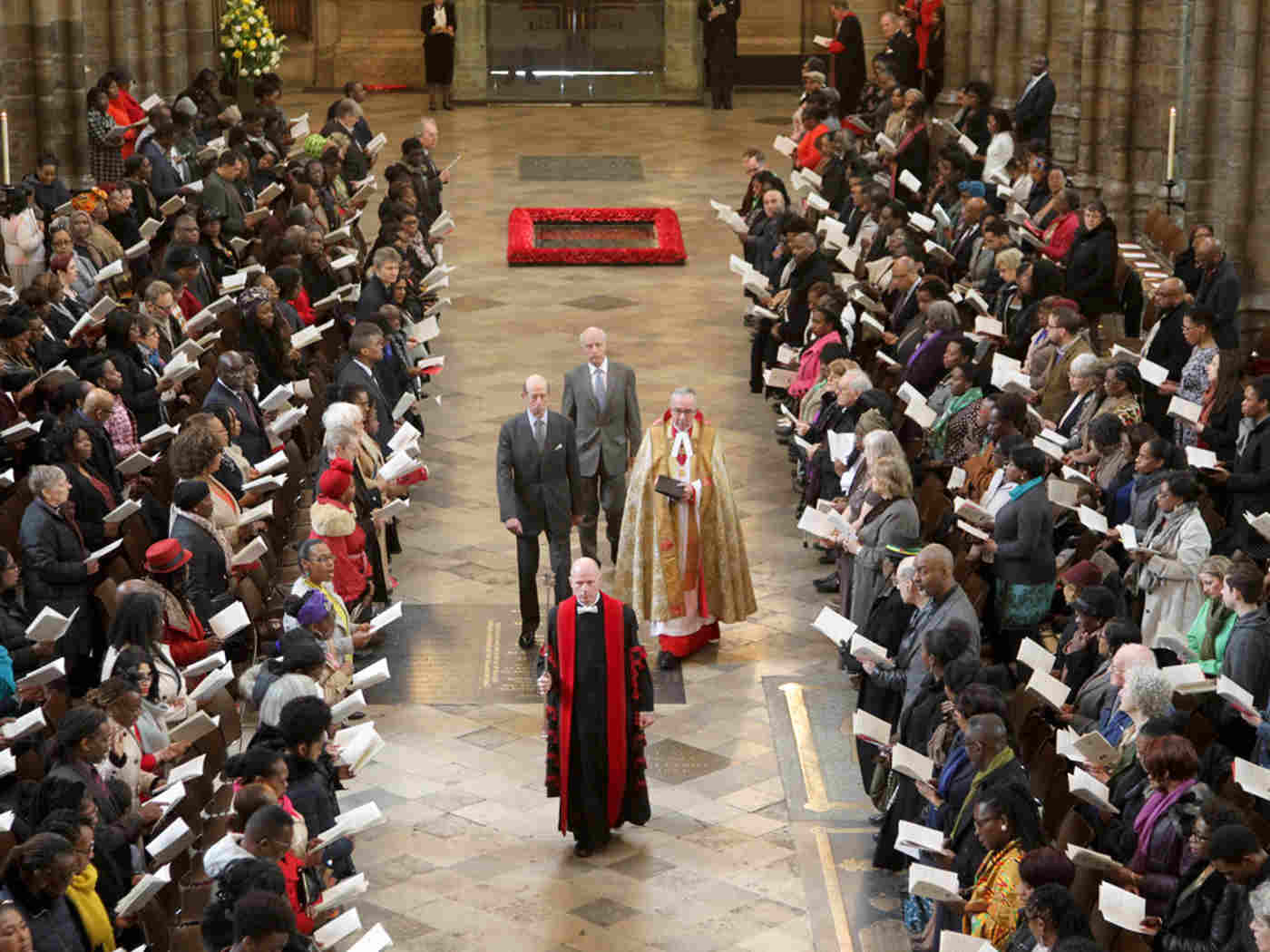 The procession moves through the Abbey at the start of the service