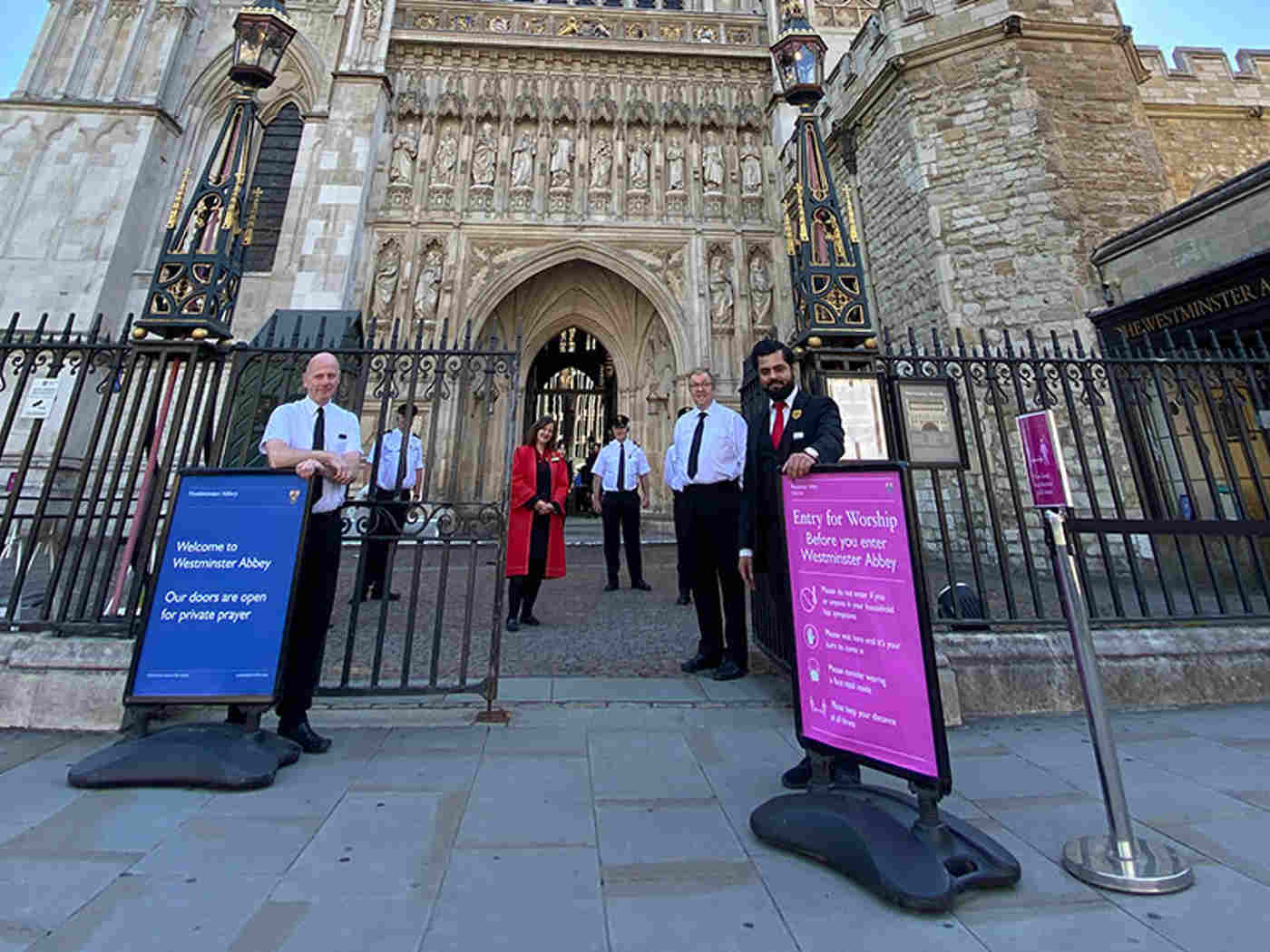 Abbey staff outside the Great West Door this morning