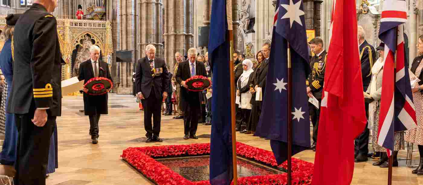 Three men by the Grave of the Unknown Warrior - two of them are about the lay wreaths