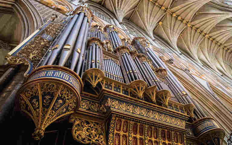 The grey and gold organ pipes in Westminster Abbey