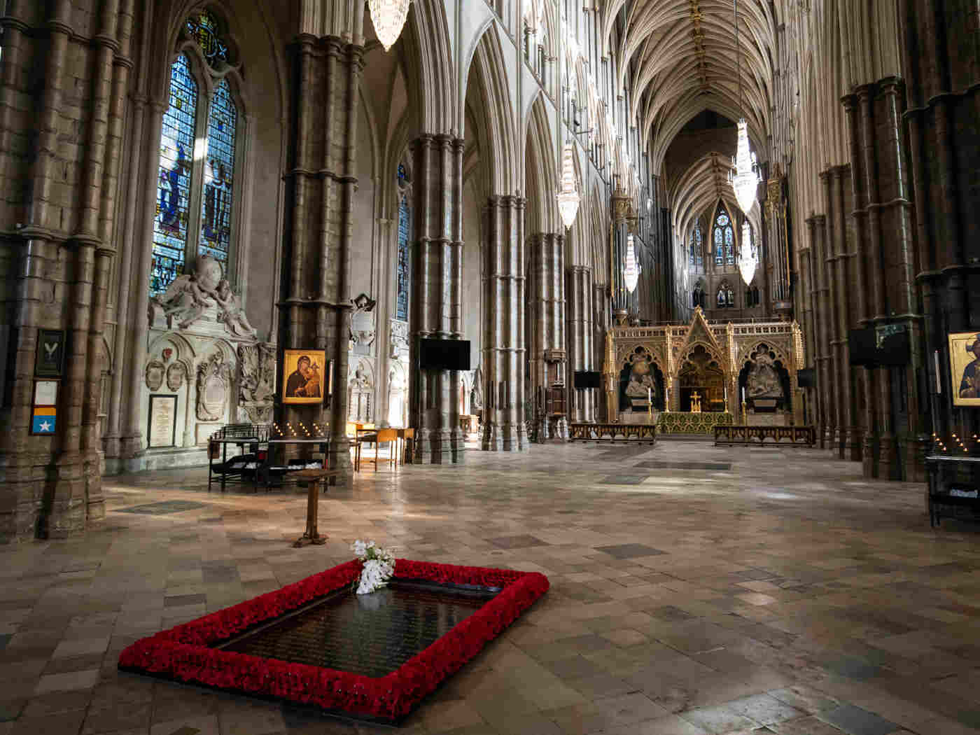 The Queen's bouquet rests on the Grave