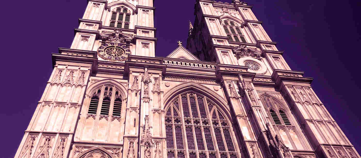External view of Westminster Abbey with a magenta colouring