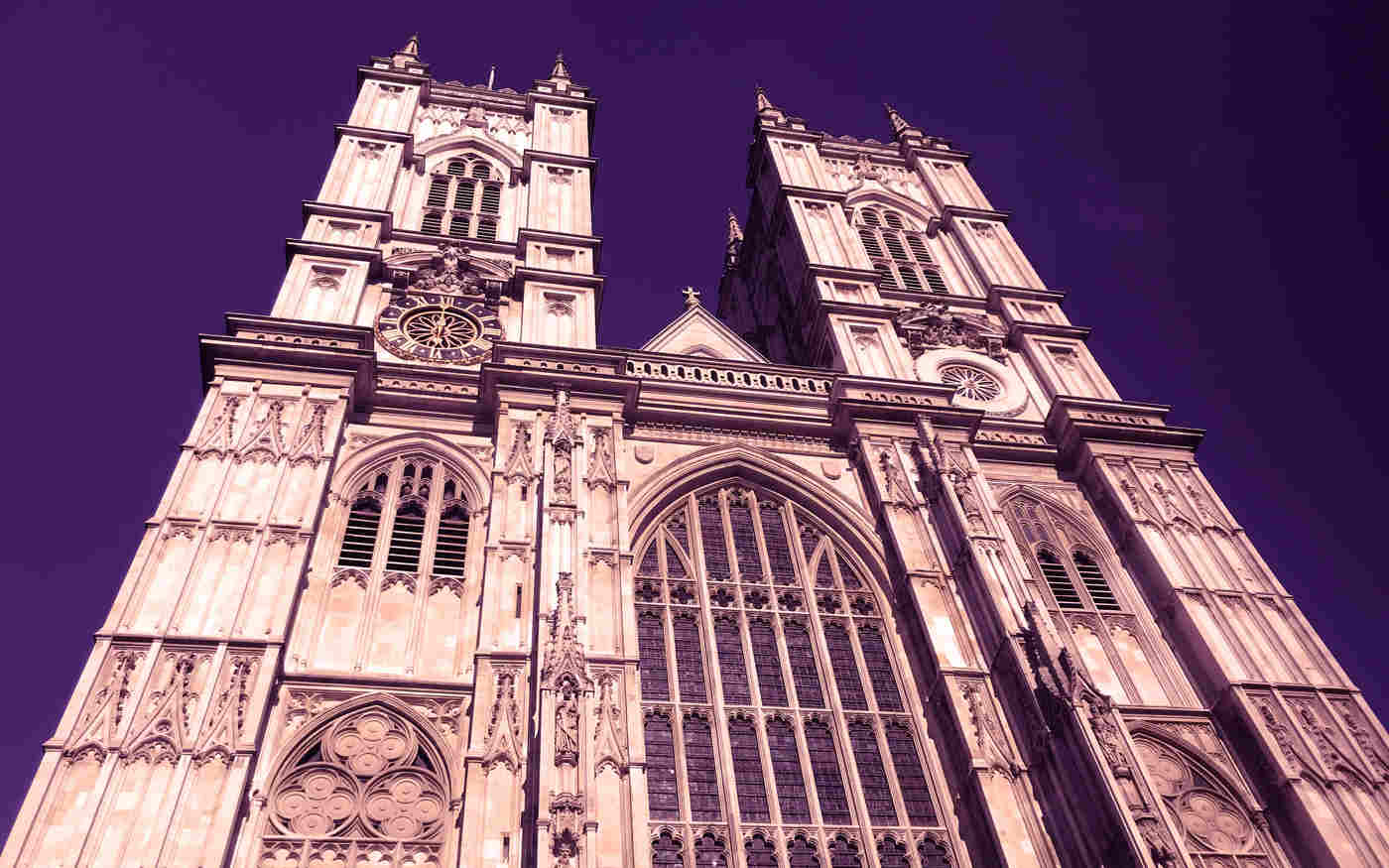 External view of Westminster Abbey with a magenta colouring