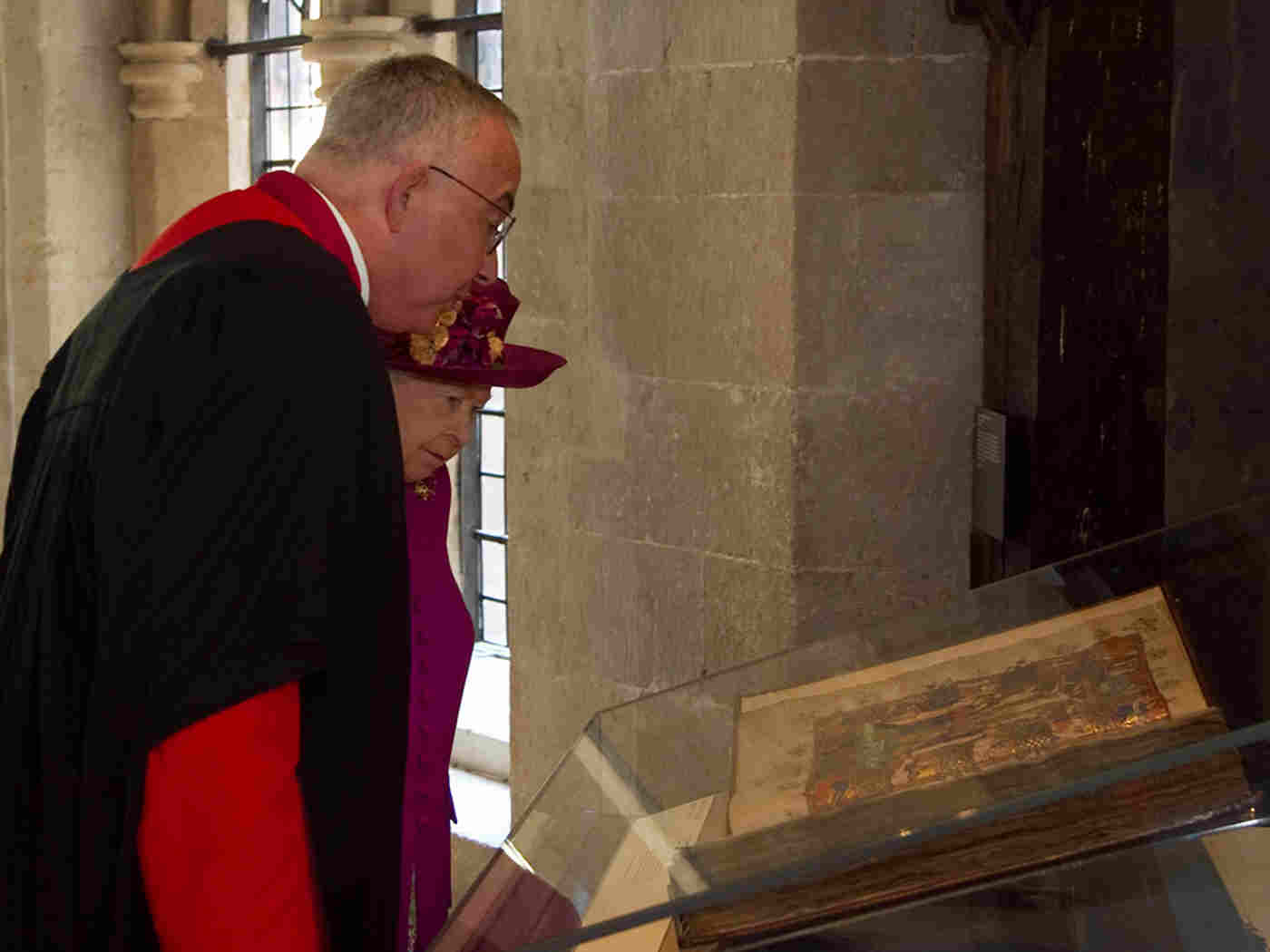 The Queen views the Liber Regalis, a 14th century guide to staging coronations