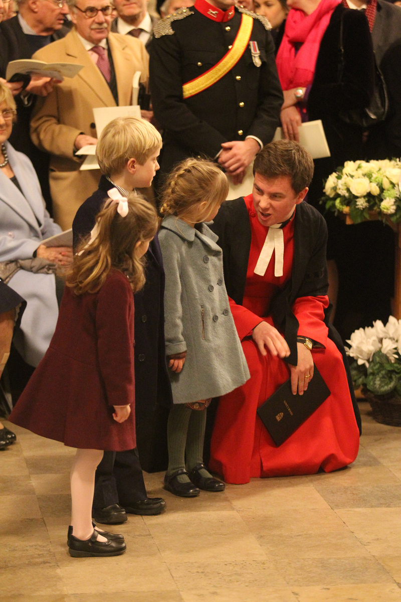 Iona Pite, John Winston Churchill, and Christabel Fraser, great-great-grandchildren of Sir Winston Churchill, with the Reverend Dr James Hawkey, Minor Canon and Precentor