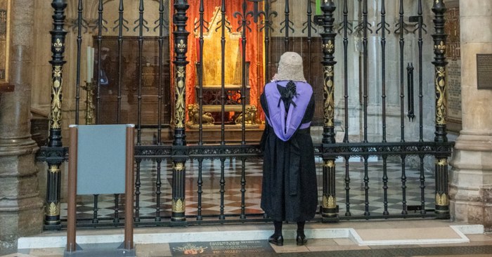 A judge looking at the Coronation Chair