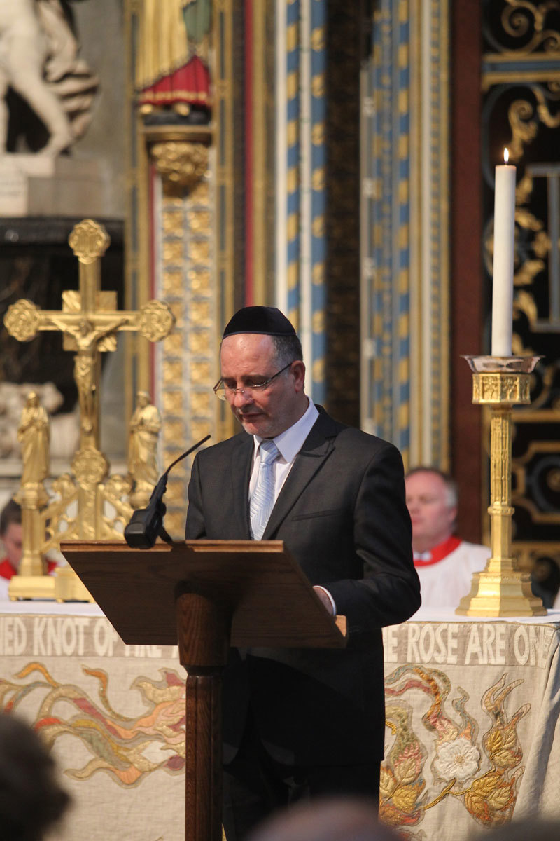 Rabbi Moshe Perez, Nottingham Hebrew Congregation, reads from the Nave Lectern