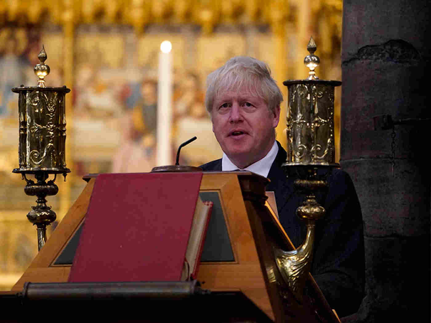 Prime Minister Boris Johnson reads from Philippians 2