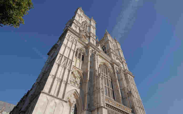 Photography of the West Towers of Westminster Abbey with a blue sky behind them