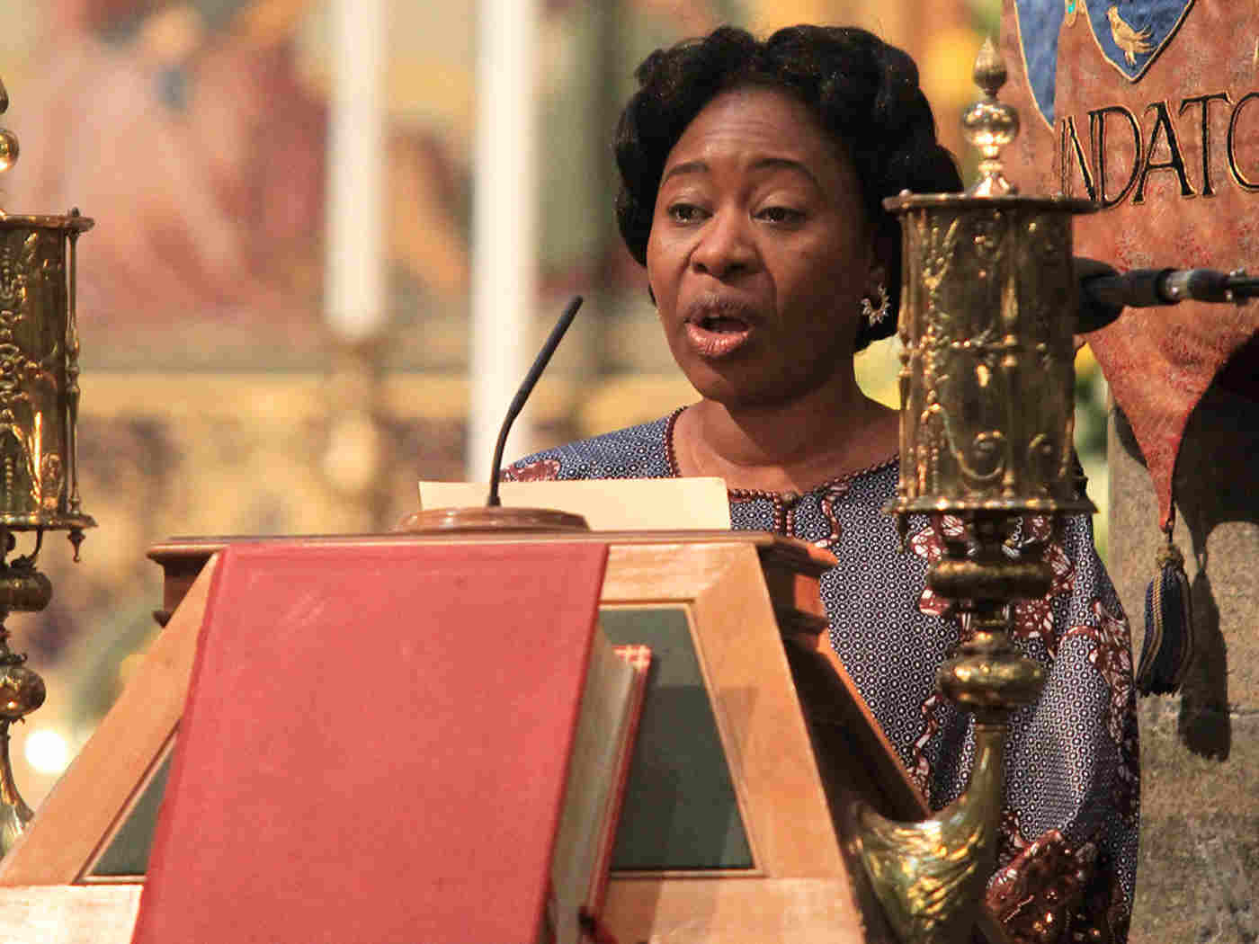 Pastor Modupe Afolabi, National Administrator, Redeemded Christian Church of God UK, reads St Luke 18: 1-8 from the Great Lectern