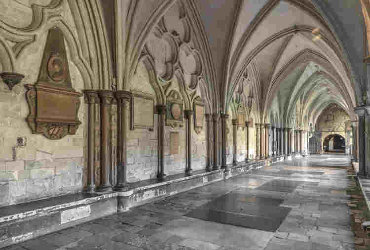 Passageway with memorial tablets on the walls and floor